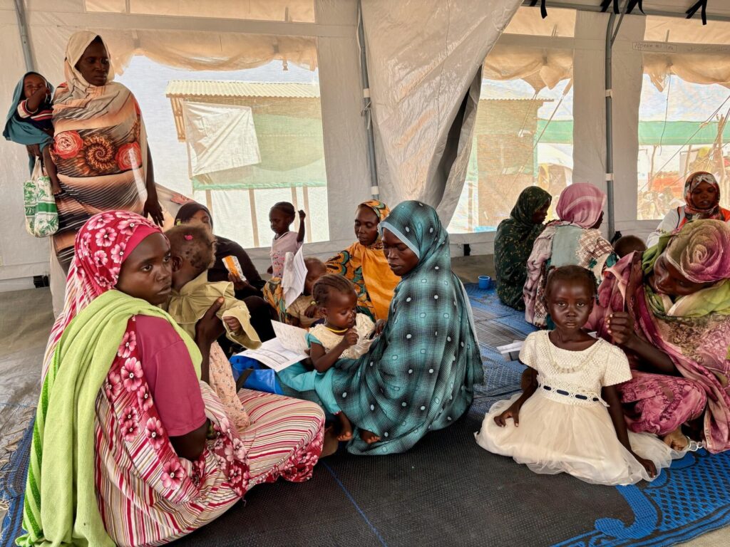 A group of mothers at the MAM clinic feed their moderately malnourished children with Plumpy’Sup provided by MSF - Sudan